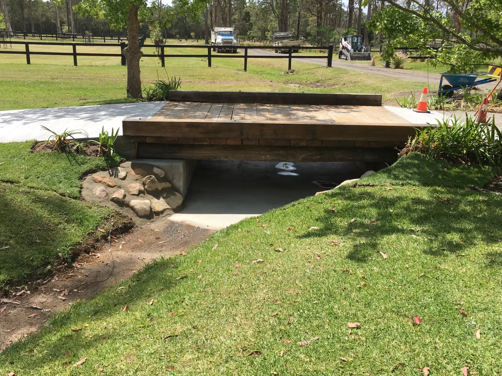 Completed timber property crossing over a formed concrete drainage culvert